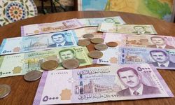 Suriye Esad'ın Portresinin Olduğu Paraları Değiştiriyor